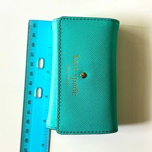 Like new. Kate Spade 6 key ring wallet.